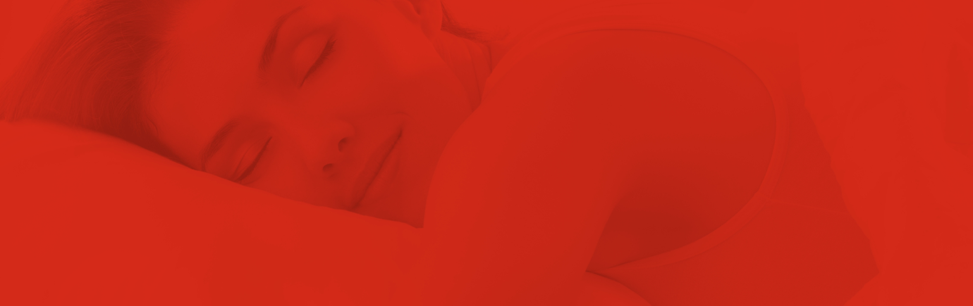 Woman sleeping soundly on her side after receiving sleep apnea services in North Olmsted