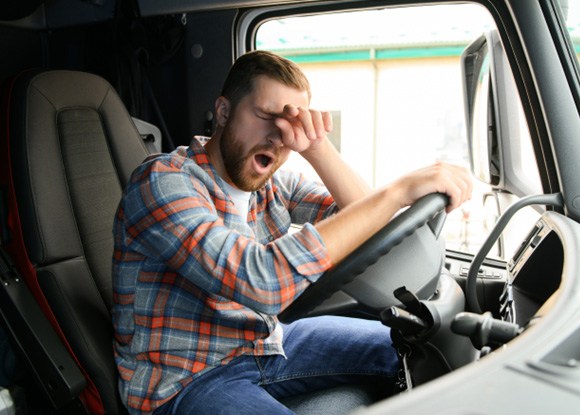 Patient in Fairview Park looking tired in their truck