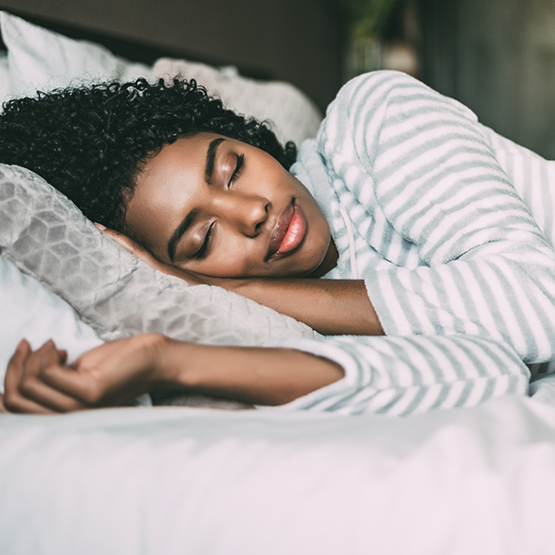 Woman sleeping soundly on her side