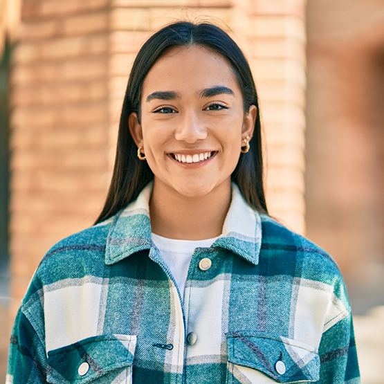 Smiling woman with long straight dark hair